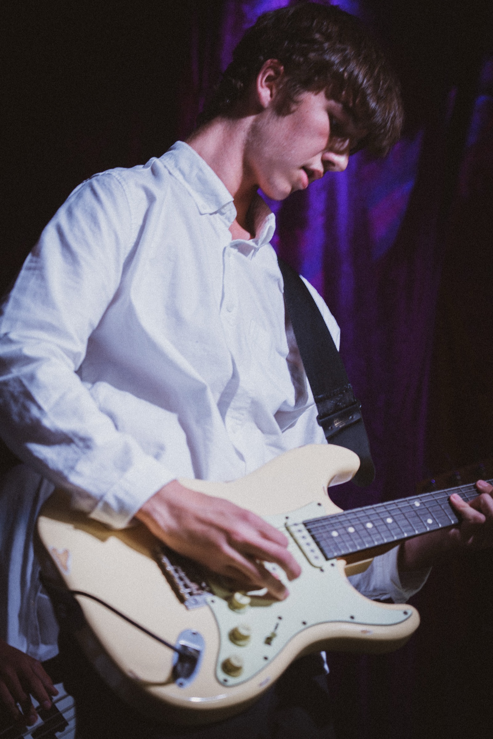 Guitarist in white shirt